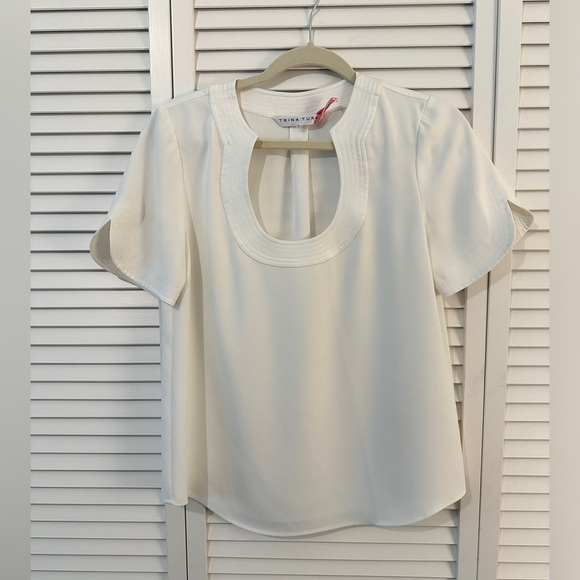 Tops - Trina Turk.  Dressy cream blouse.  Size small.  Great condition.